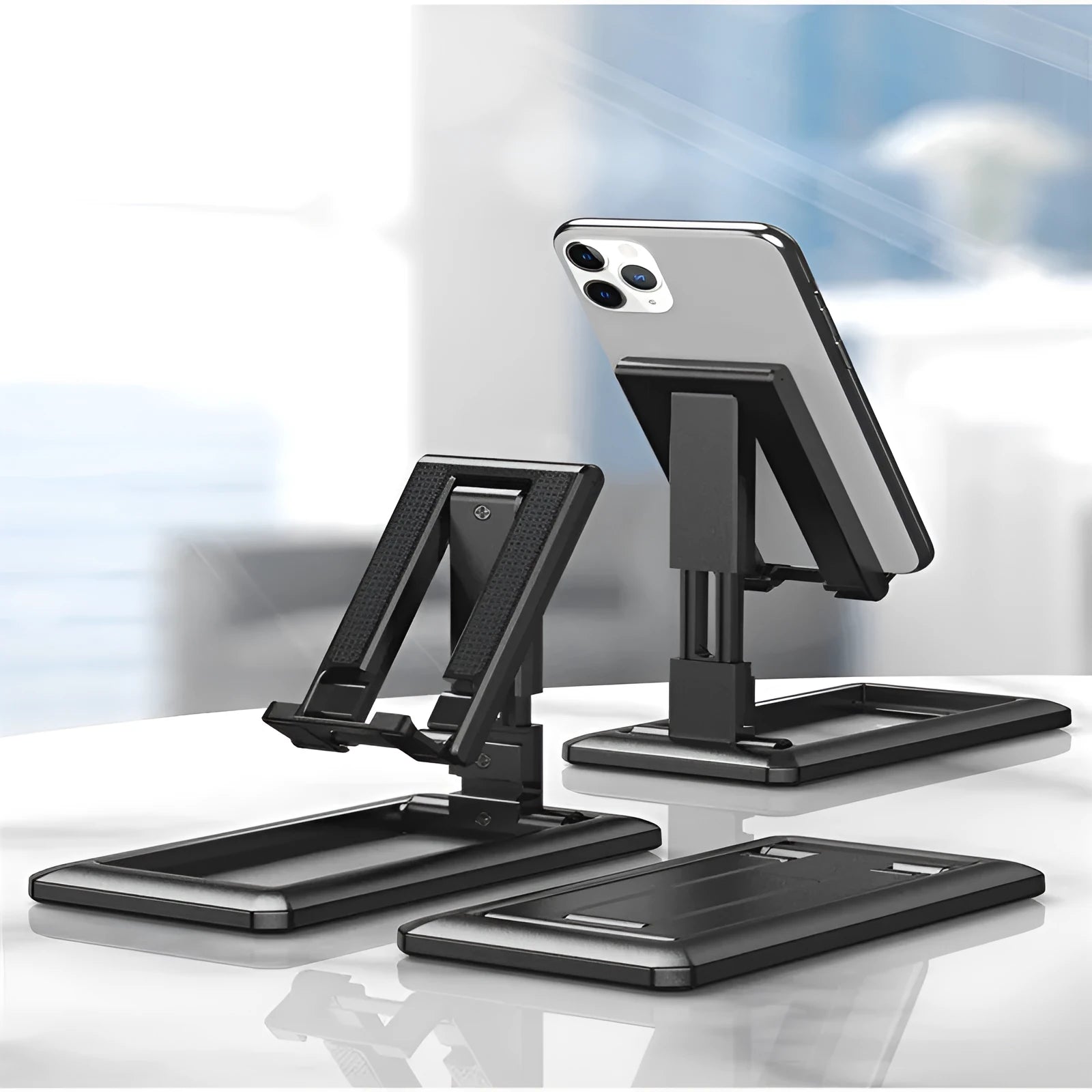Retractable folding mobile phone stand in black, green, pink or white with adjustable height mechanism