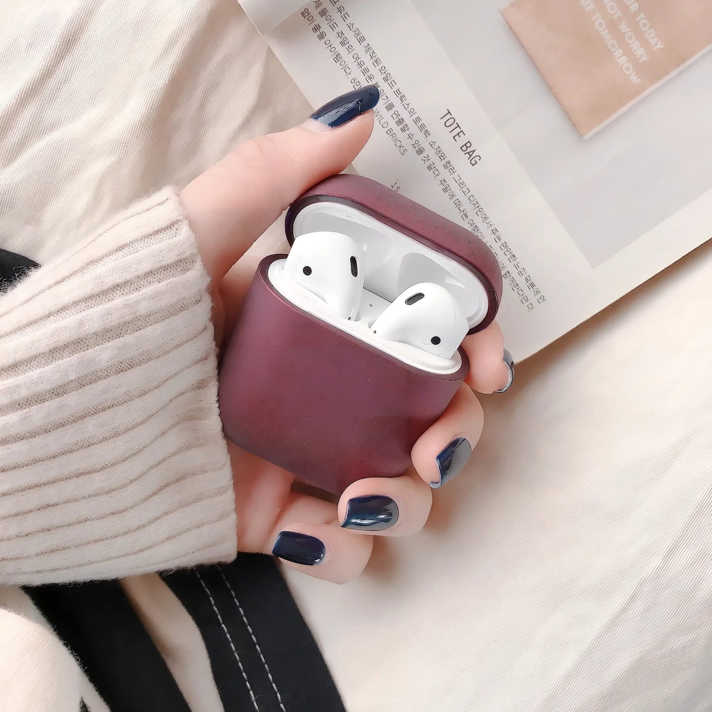 Black plastic wireless Bluetooth headset case for AirPods 1 and 2, 5.8 cm size with snap lid