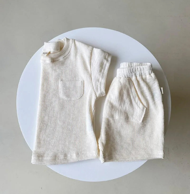 Baby romper summer cotton short sleeve solid colour pullover with triangle bag fart detail, loose fit, beige colour
