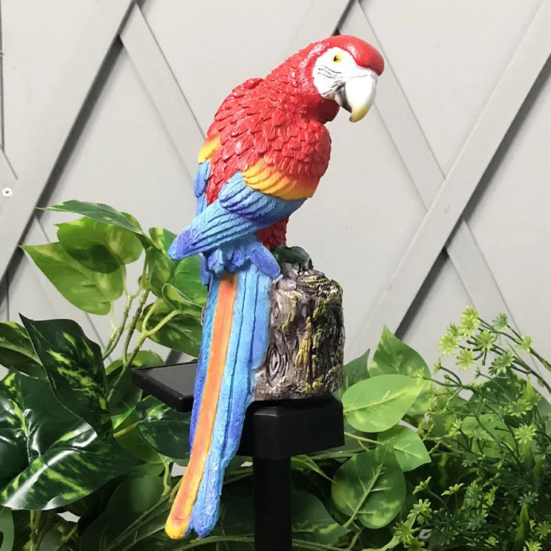 Hand-painted resin parrot solar light with LED glow for garden decoration, available in red blue yellow