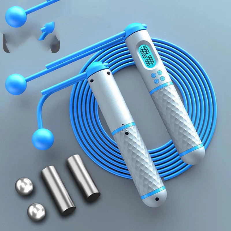 Intelligent counting skipping rope with black yellow ABS handles and load-bearing balls on a wooden floor