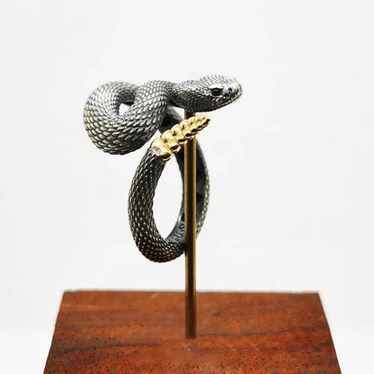 Adjustable copper snake ring in black and white with gold tail options