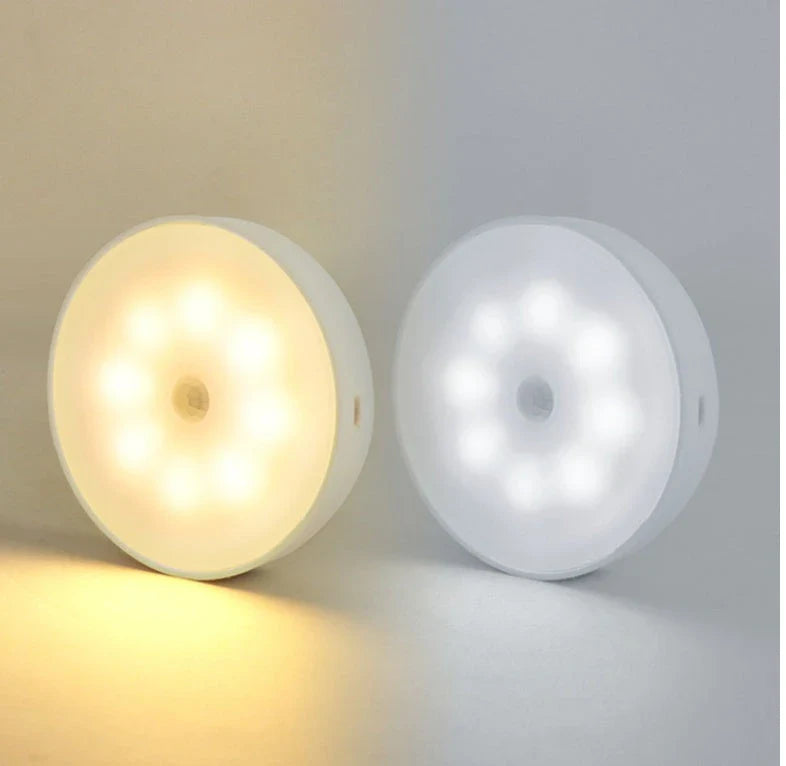 USB rechargeable motion sensor LED puck light for cabinets and night use