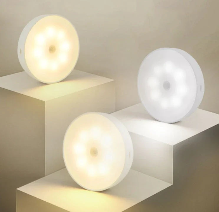 USB rechargeable motion sensor LED puck light for cabinets and night use