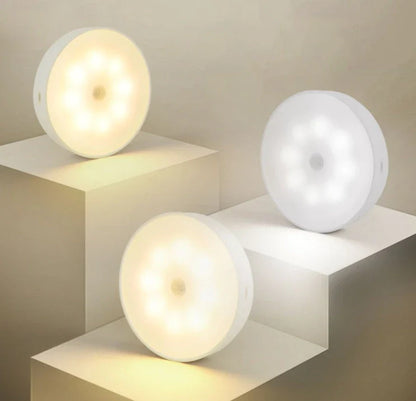 USB rechargeable motion sensor LED puck light for cabinets and night use