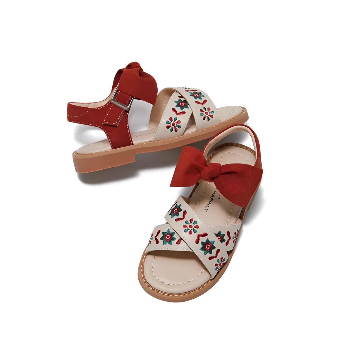 Red girls' soft-soled floral shoes with bow detail and Velcro strap, side view