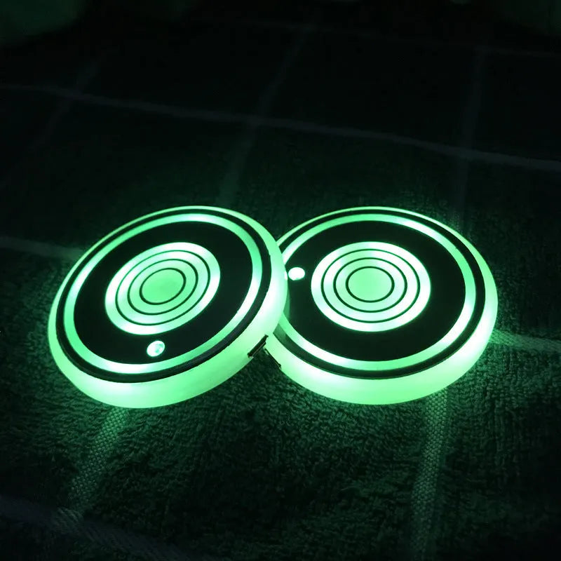 LED luminous acrylic water coaster 68mm diameter with five colour style options on a table