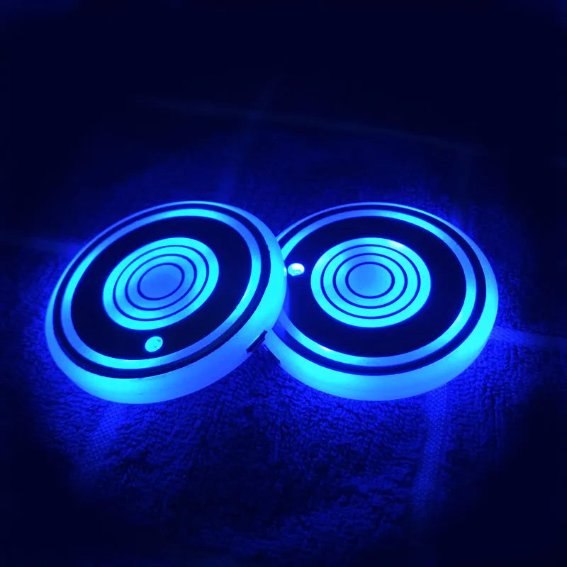 LED luminous acrylic water coaster 68mm diameter with five colour style options on a table
