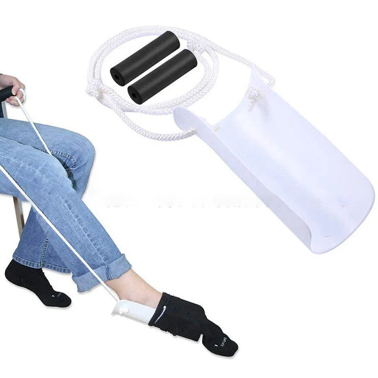 White plastic sock aid with black EVA handle for putting on socks without stretching