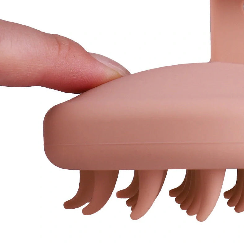 Black silicone scalp massager brush measuring 80mm wide with rounded bristle tips