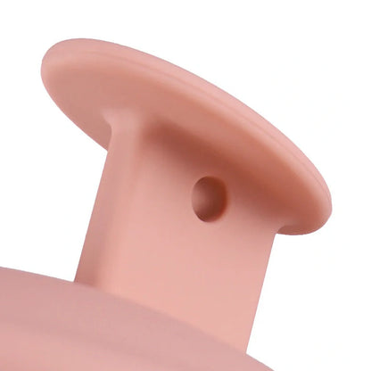 Black silicone scalp massager brush measuring 80mm wide with rounded bristle tips