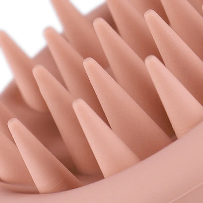 Black silicone scalp massager brush measuring 80mm wide with rounded bristle tips