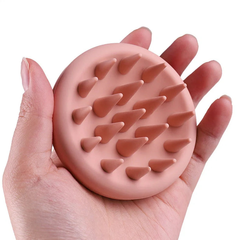 Black silicone scalp massager brush measuring 80mm wide with rounded bristle tips