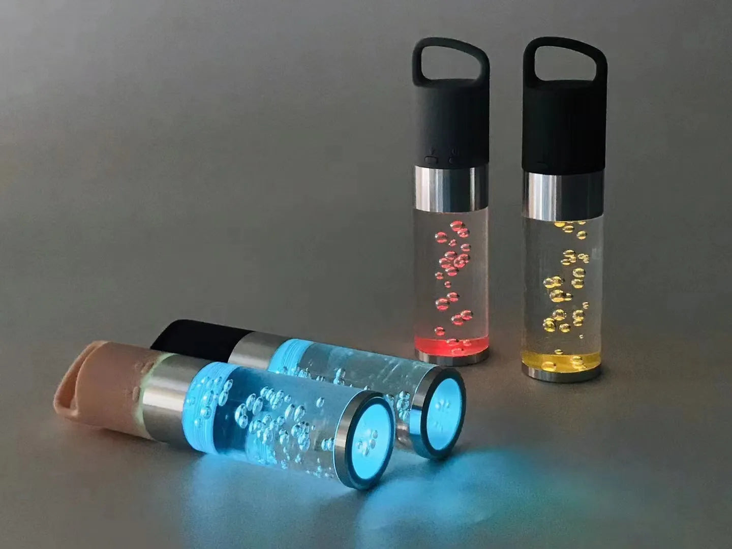 Colourful cartoon crystal light portable Bluetooth speaker in pink, showing compact size.