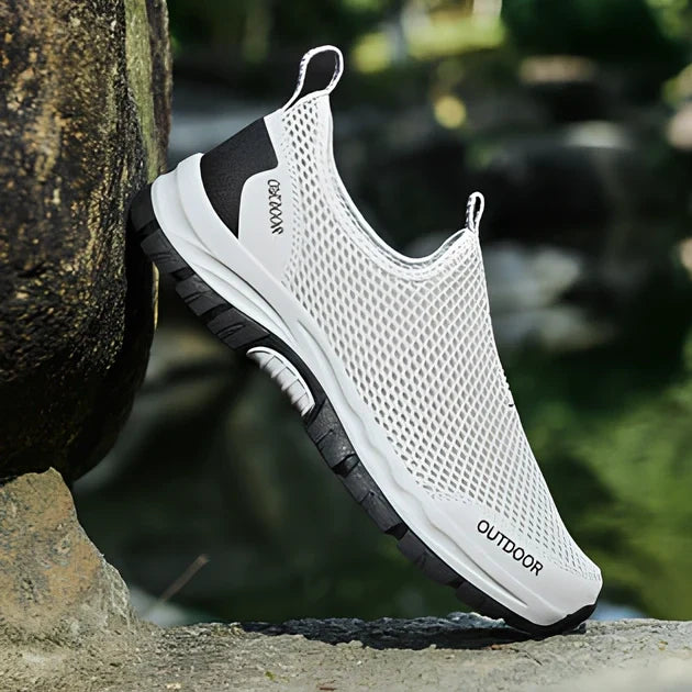 Men's breathable hollow mesh slip-on casual shoes with ventilation openings and TPR sole
