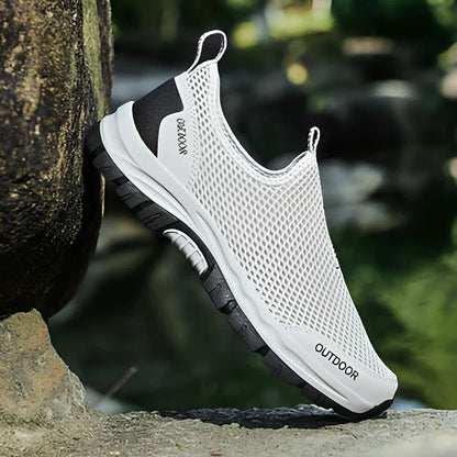 Men's breathable hollow mesh slip-on casual shoes with ventilation openings and TPR sole