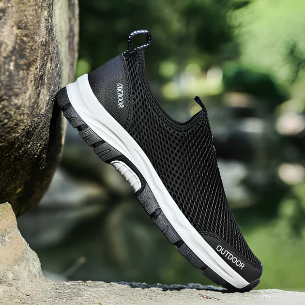 Men's breathable hollow mesh slip-on casual shoes with ventilation openings and TPR sole