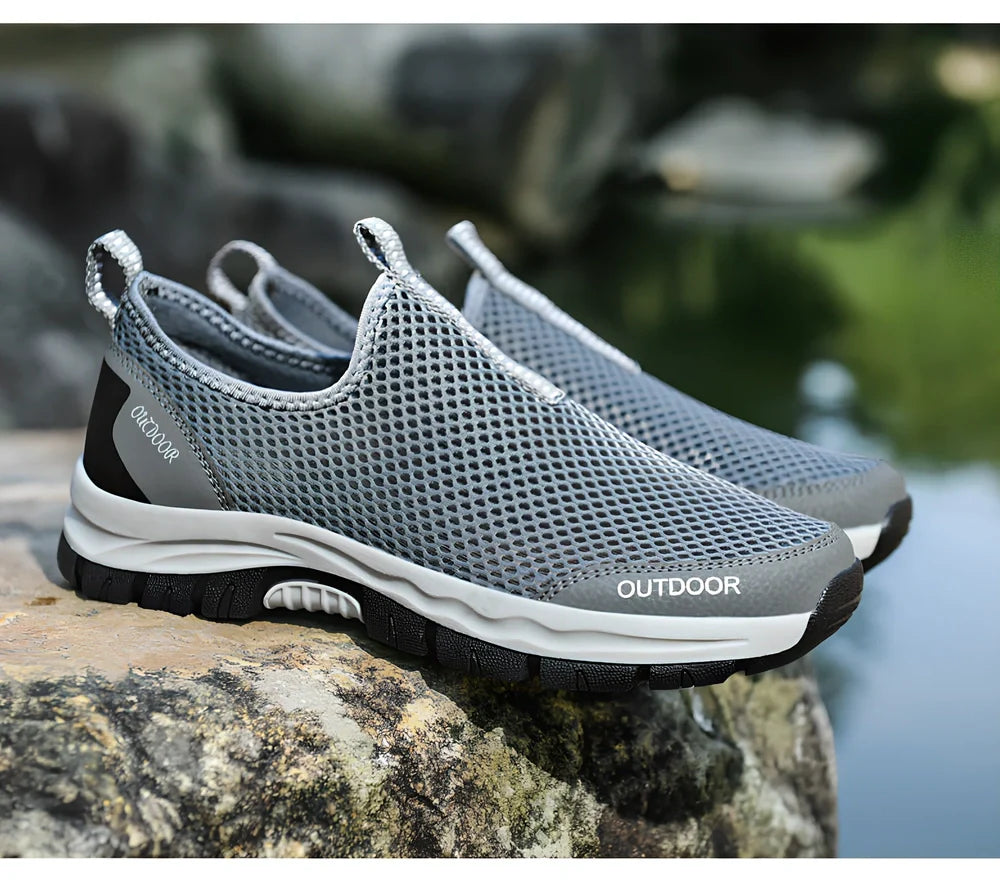 Men's breathable hollow mesh slip-on casual shoes with ventilation openings and TPR sole
