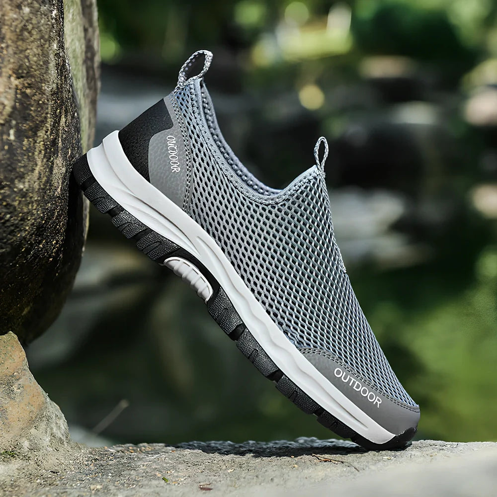 Men's breathable hollow mesh slip-on casual shoes with ventilation openings and TPR sole