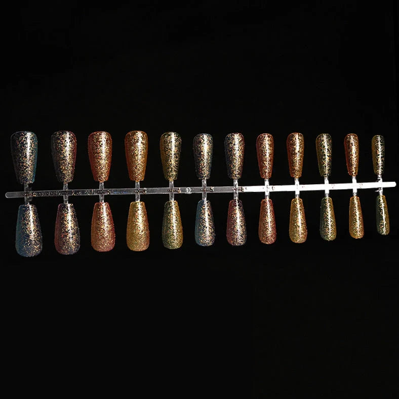 Ballet gradient glitter false nails with trapezoidal shape showing glitter density variation from cuticle to tip