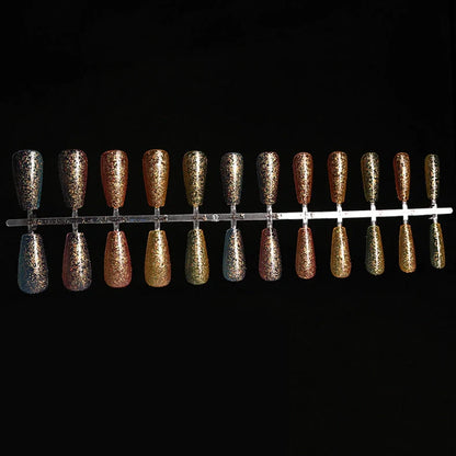 Ballet gradient glitter false nails with trapezoidal shape showing glitter density variation from cuticle to tip