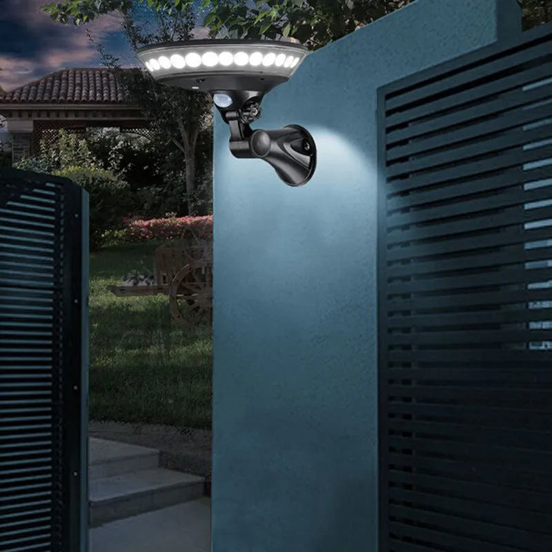 White ABS plastic solar-powered garden light with 360-degree LED illumination panel.
