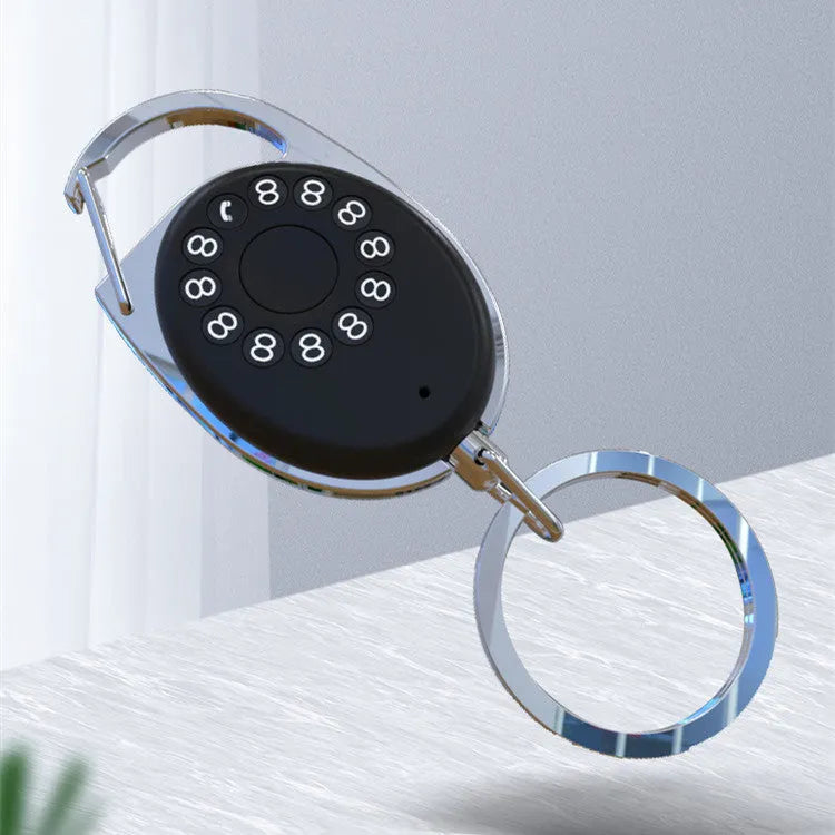 Black Bluetooth anti-lost tracker keychain compatible with Apple Find My network on a metal key ring
