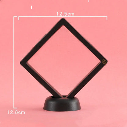 3D floating jewelry display stand showcasing earrings and coins in mid-air