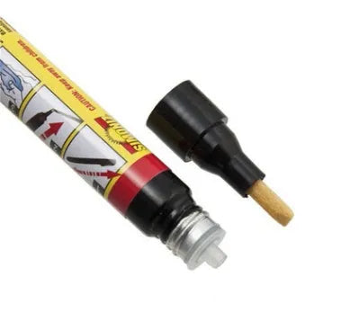 Transoceanic car touch-up pen with clear coat repair resin in aluminum tube, on surface