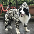 Green camouflage dog raincoat for large breeds with four-leg coverage and fluorescent strips, shown on a standing dog
