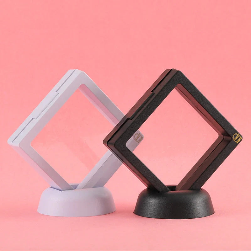 3D floating jewelry display stand showcasing earrings and coins in mid-air