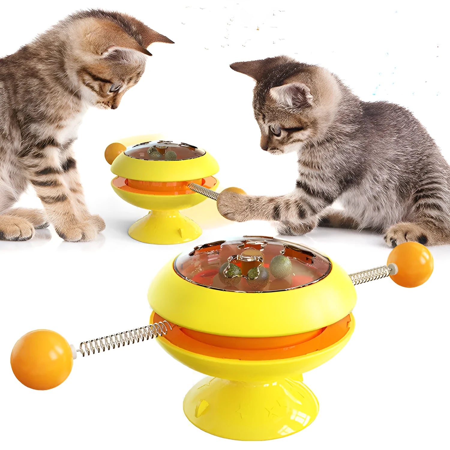 Rotatable cat toy with transparent top containing catnip balls and suction cup base