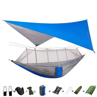 Parachute hammock with mosquito net in various colors and sizes, ideal for outdoor adventures and relaxation