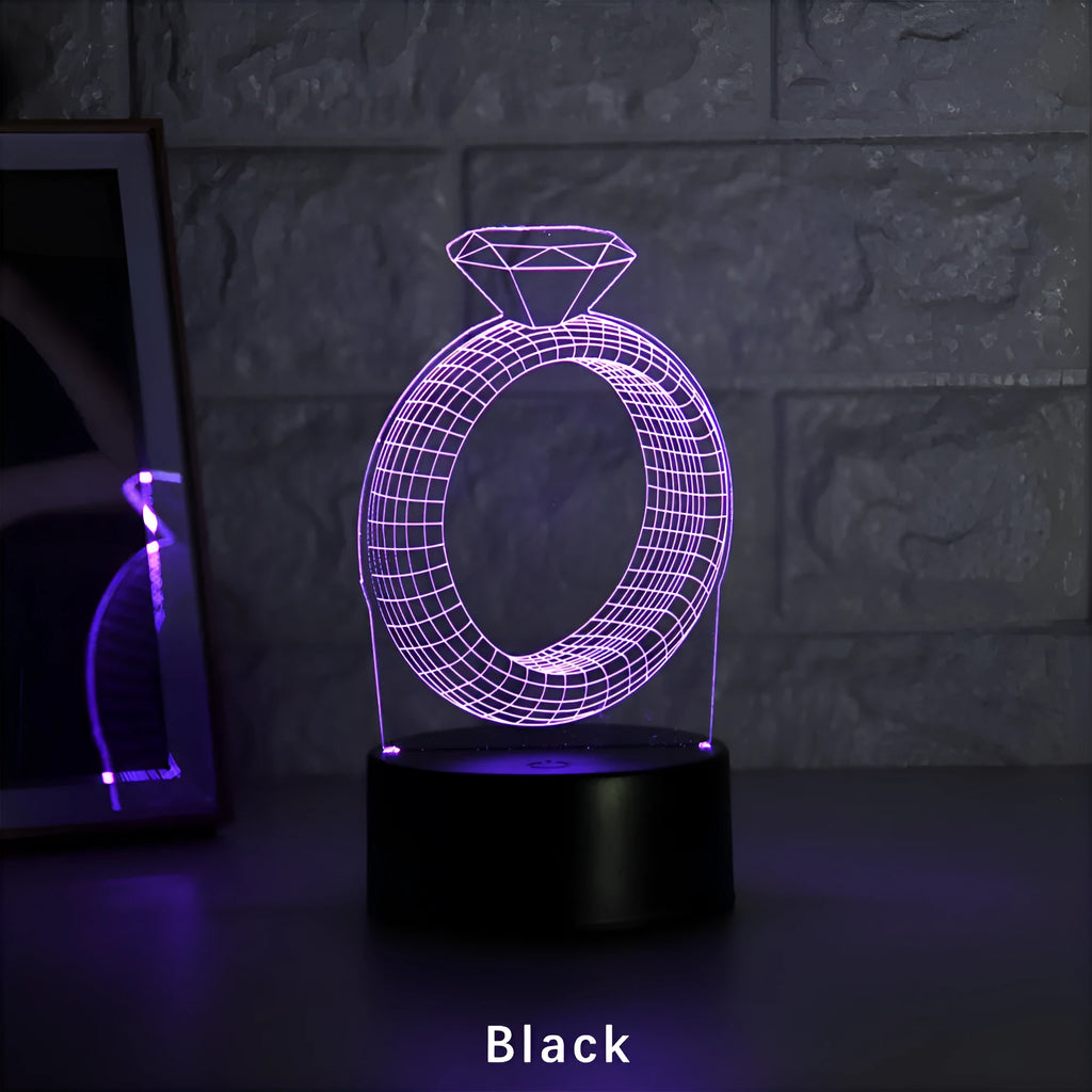 3D LED night light with laser-engraved diamond ring design on colour-changing acrylic panel.