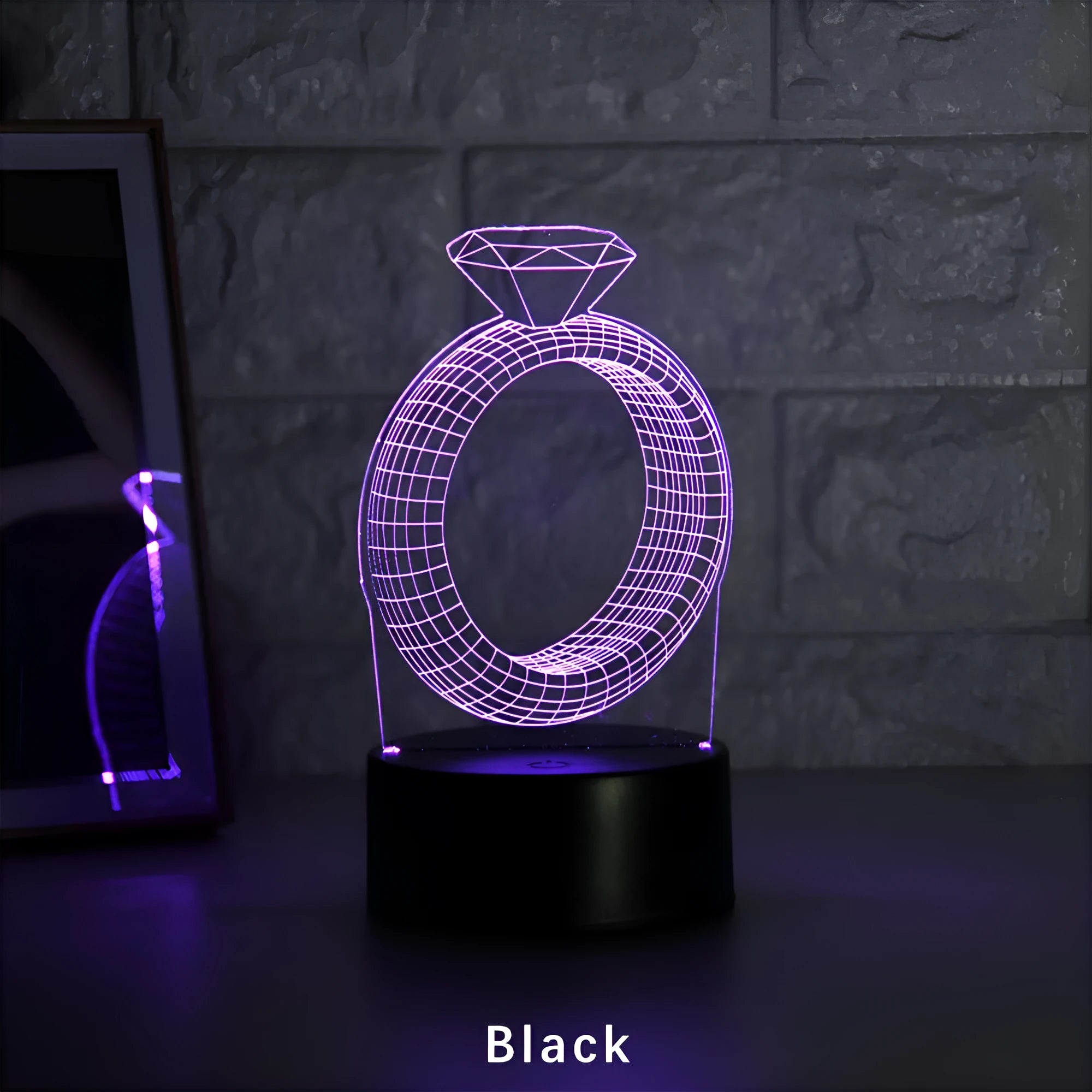 3D LED night light with laser-engraved diamond ring design on colour-changing acrylic panel.