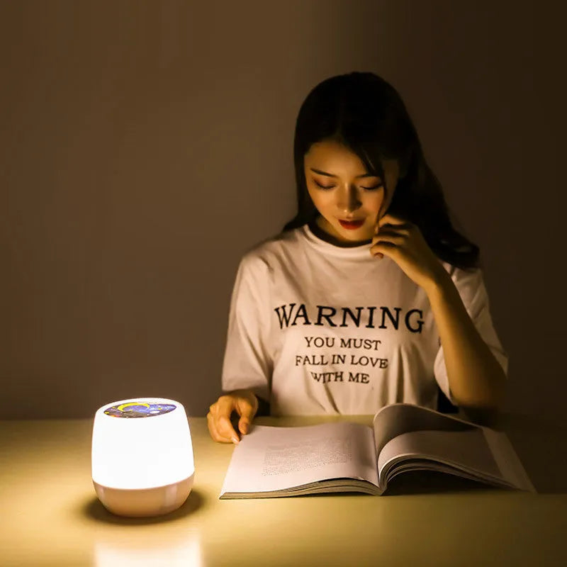 Pruixin PRX1363 rotating projector night light projecting star patterns on a wall.