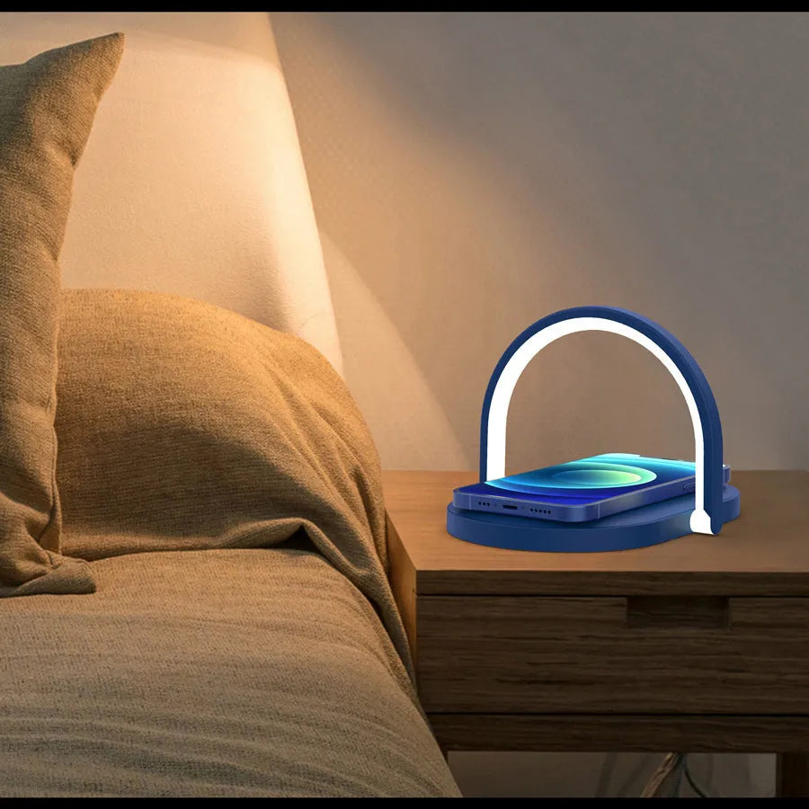Black and white wireless charger night light with phone holder showing 15W fast charging capability