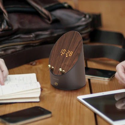 Sleek wooden wireless speaker with induction charging, digital alarm clock, and Bluetooth 5.0 connectivity