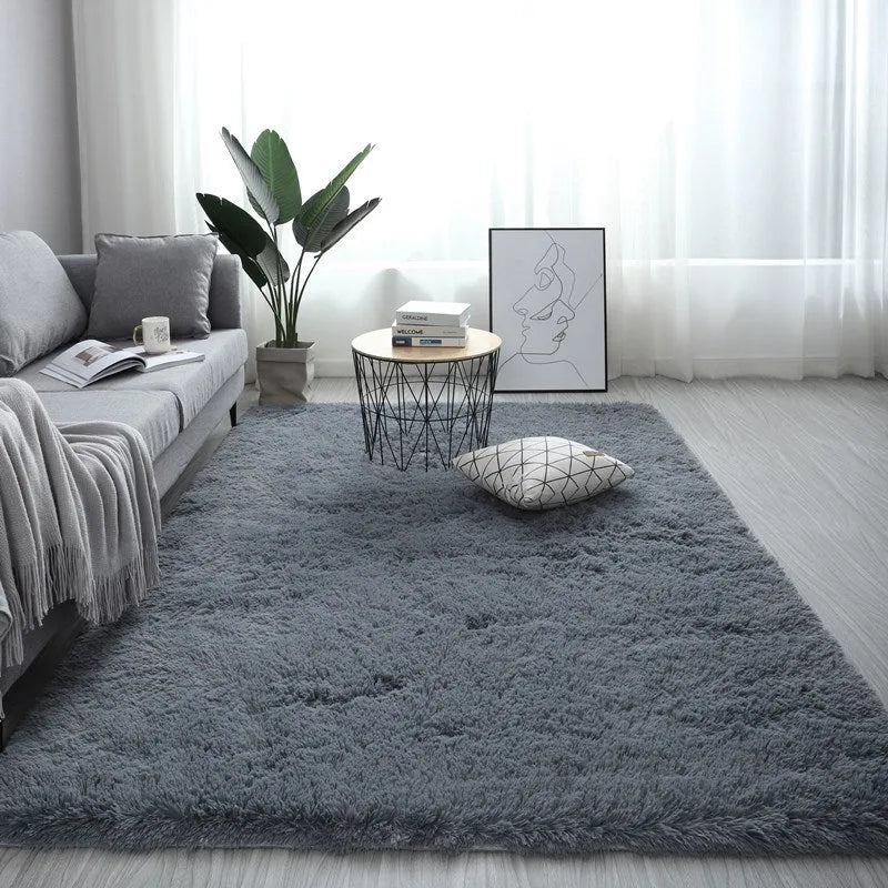 Nordic fluffy plush rectangular carpet with anti-slip base in beige colour on wooden floor