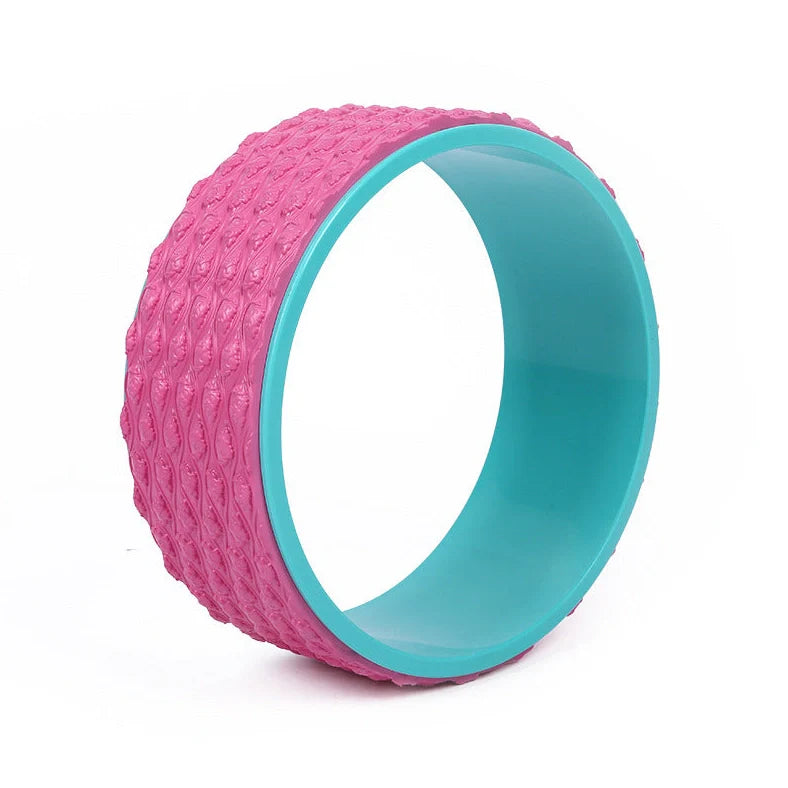 Purple yoga wheel with massage point surface measuring 113cm long and 32cm diameter for muscle relaxation