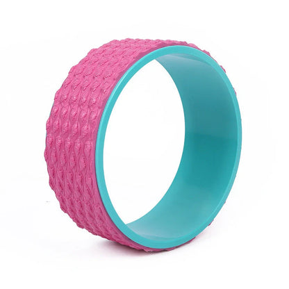 Purple yoga wheel with massage point surface measuring 113cm long and 32cm diameter for muscle relaxation