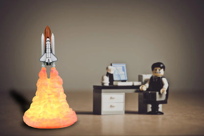 A 3D-printed rocket-shaped night light with adjustable LED lighting, made from eco-friendly PLA material