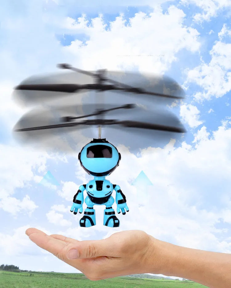 Blue plastic floating robot toy with rechargeable lighting for night market stall display, 17cm tall, USB charging