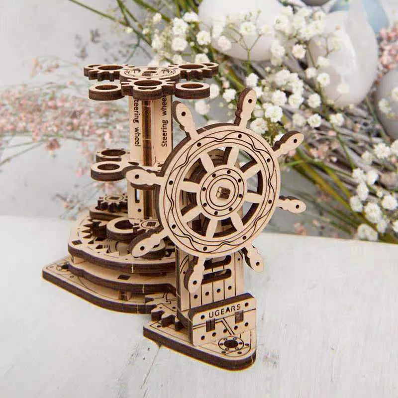 Ukrainian wooden rotating model pen holder on a desk.