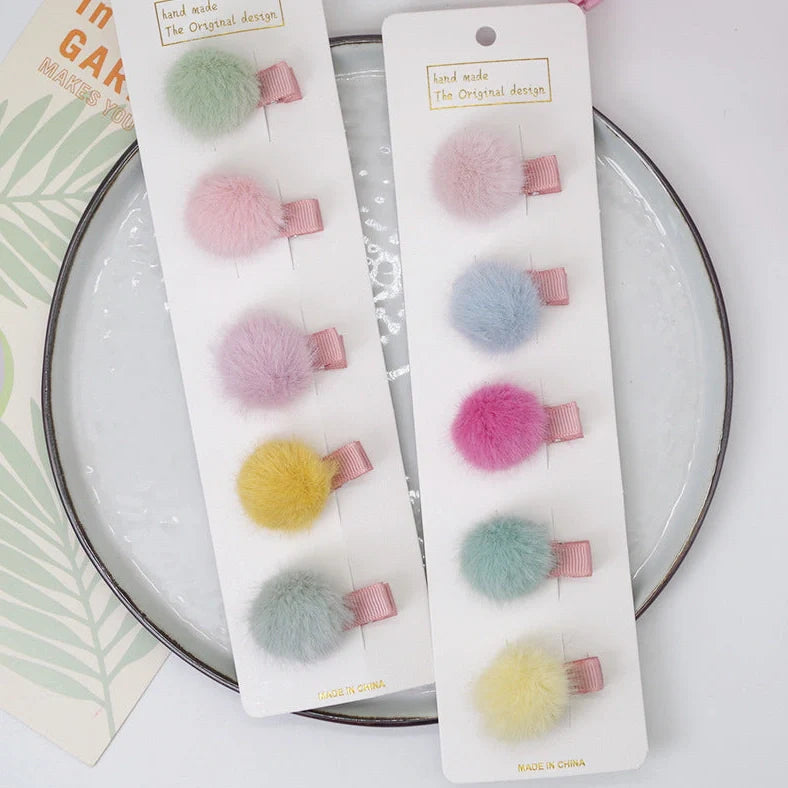 Children's hair ball hairpin with side clip design in candy colours and rainbow elements, offering 2 sets of random colour combinations for varied styling options in Korean-inspired geometry shapes