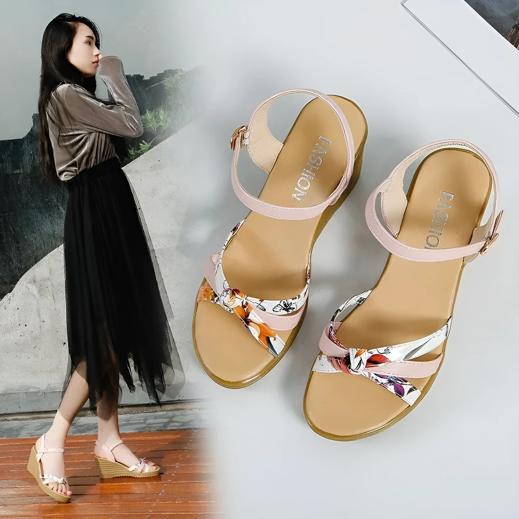 Women's pink and white PU wedge sandals with a thick heel, fish mouth design, and buckle closure.