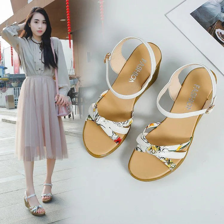 Women's pink and white PU wedge sandals with a thick heel, fish mouth design, and buckle closure.
