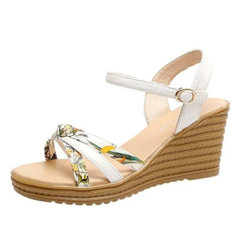 Women's pink and white PU wedge sandals with a thick heel, fish mouth design, and buckle closure.