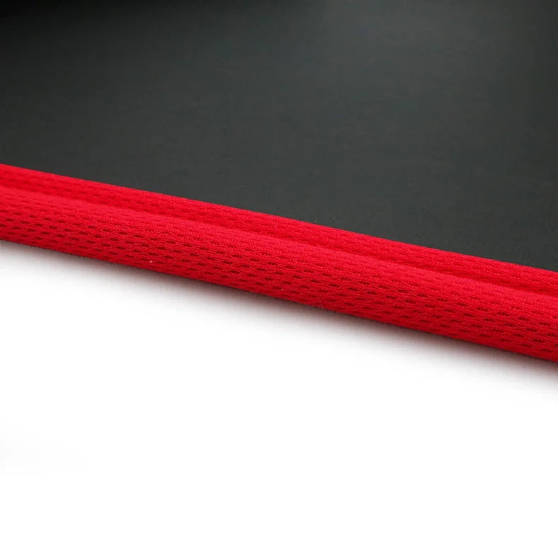 Wrapped non-slip yoga mat showing 10mm thickness and 183cm length with textured surface