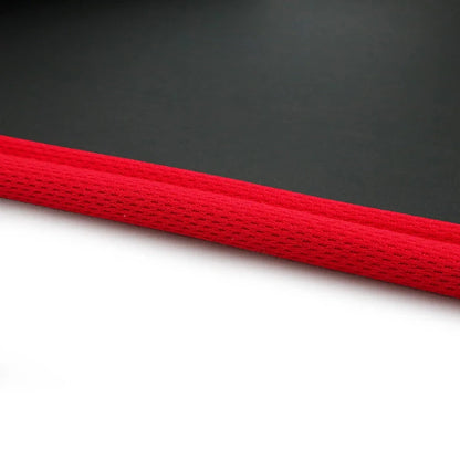 Wrapped non-slip yoga mat showing 10mm thickness and 183cm length with textured surface